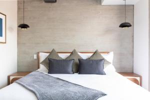Un ou plusieurs lits dans un hébergement de l'établissement Capitalia - Luxury Apartments - Polanco Moliere