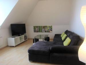 Televízia a/alebo spoločenská miestnosť v ubytovaní Appartement cosy au cœur de La Forêt-Fouesnant, à 5 min de la plage - FR-1-481-121 + 4 fotografie