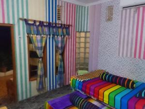 Letto o letti in una camera di Pelemkecut Double-Degree Syariah Accommodation
