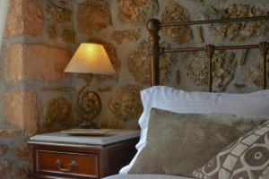 Posteľ alebo postele v izbe v ubytovaní Nymfes Guesthouse