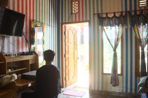 TV o dispositivi per l'intrattenimento presso Pelemkecut Double-Degree Syariah Accommodation