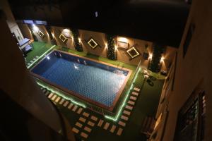 Výhled na bazén z ubytování Swat Olaya Hotel Apartments nebo okolí