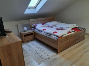 Un pat sau paturi într-o cameră la Privat Magnolia