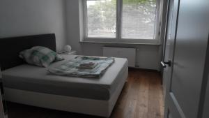 Ένα ή περισσότερα κρεβάτια σε δωμάτιο στο Brilliant Home Messe