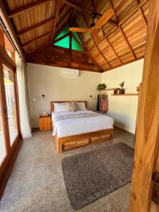 Postel nebo postele na pokoji v ubytování Jati Kuta Lombok + 37 fotografií