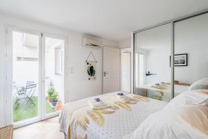 Posteľ alebo postele v izbe v ubytovaní Le CapCanaille par Dodo-a-Cassis