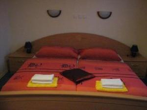 Postel nebo postele na pokoji v ubytování Apartmaji Sparakel