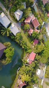 an overhead view of a group of houses next to a river at Baan Thai House in Phra Nakhon Si Ayutthaya
