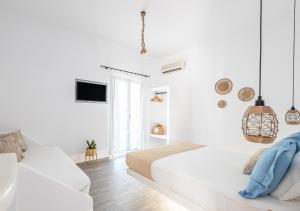 Ένα ή περισσότερα κρεβάτια σε δωμάτιο στο Dorkas Luxury Rooms&Apartments