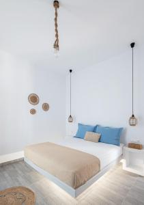 Ένα ή περισσότερα κρεβάτια σε δωμάτιο στο Dorkas Luxury Rooms&Apartments