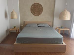 Posteľ alebo postele v izbe v ubytovaní A pleasent small -studio close to the port of Volos