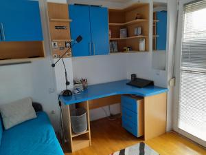Kuchyň nebo kuchyňský kout v ubytování Family Apartman