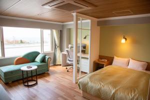 Cama ou camas em um quarto em Shiretoko Daiichi Hotel