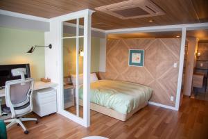Cama ou camas em um quarto em Shiretoko Daiichi Hotel