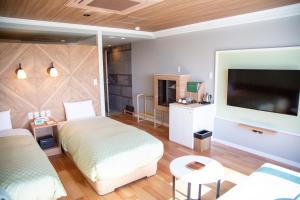 Cama ou camas em um quarto em Shiretoko Daiichi Hotel