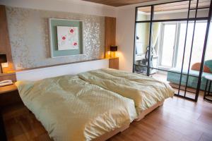 Cama ou camas em um quarto em Shiretoko Daiichi Hotel