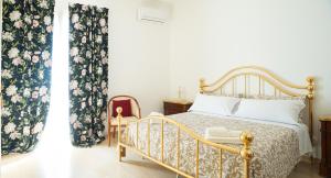Postel nebo postele na pokoji v ubytování Katamera Guest House