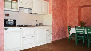 Kuchyňa alebo kuchynka v ubytovaní Agriturismo Monte Gusciani