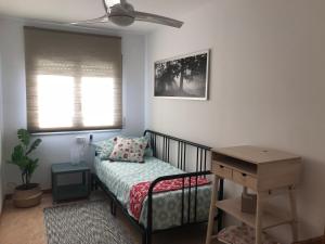 Postel nebo postele na pokoji v ubytování Apartamento recién reformado con vistas al río