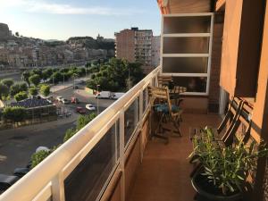 a balcony with a view of a street at Apartamento recién reformado con vistas al río in Balaguer