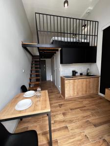 Kuchyňa alebo kuchynka v ubytovaní Property Apart - plac Jana Pawla II Centrum