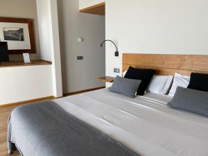 Letto o letti in una camera di L'Avenc Benestar Rural