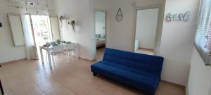 A seating area at Stella Marina Holiday Home