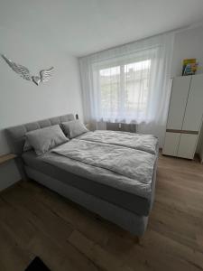 Postel nebo postele na pokoji v ubytování Apartment 2 Gäste