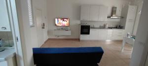A kitchen or kitchenette at Stella Marina Holiday Home