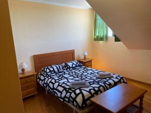 Postel nebo postele na pokoji v ubytování Ermita (2) San Vicente de la Barquera duplex