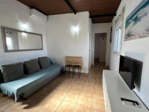 Telewizja i/lub zestaw kina domowego w obiekcie Casita cerca de la playa para 2 personas