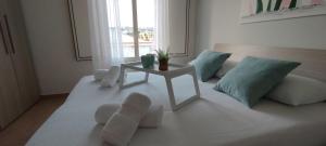 A bed or beds in a room at Stella Marina Holiday Home