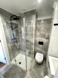 Et badeværelse på Attic Studio Jeżyce + 5 billeder