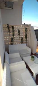 A seating area at Stella Marina Holiday Home