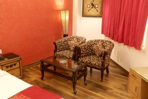 Posezení v ubytování Airport Hotel Le Seasons New Delhi