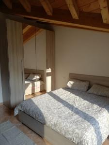 Postel nebo postele na pokoji v ubytování Residence TANA - via Pasubio + 8 fotografií