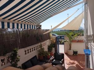 Balkon lub taras w obiekcie PLAYA ALMARDA CORINTO, PISCINA, WIFI,2 TERRAZAS, BARBACOA,TRANQUILo