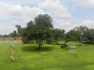 Area giochi per bambini di Hotel Hacienda Taboada (Aguas Termales)