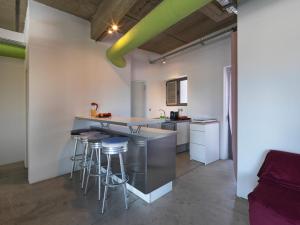 Kuchyň nebo kuchyňský kout v ubytování Ceramus Apartments Gazi View