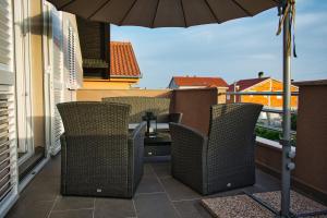 Balkón nebo terasa v ubytování Apartments and Rooms B&B
