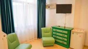TV a/nebo společenská místnost v ubytování Complex Vile Neptun-Olimp