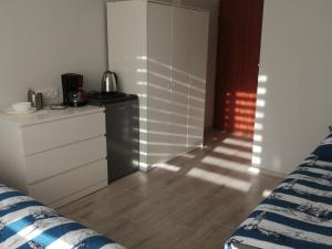 Postel nebo postele na pokoji v ubytování VillaDudek