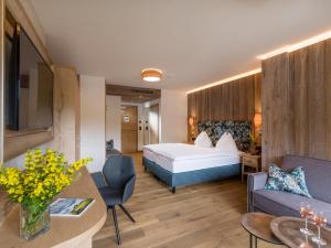Postel nebo postele na pokoji v ubytování Hotel Zentral ****superior
