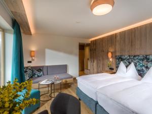 Postel nebo postele na pokoji v ubytování Hotel Zentral ****superior