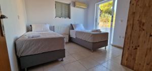 Fotografia z galérie ubytovania Villa Madenia v destinácii Porto Heli