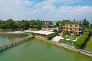 an aerial view of a house next to a river at Casa dei Pescatori in Sirmione