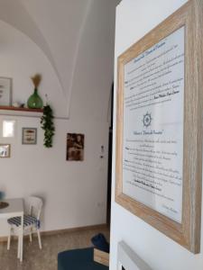 Certifikát, hodnocení, plakát nebo jiný dokument vystavený v ubytování Dimora del Pescatore