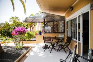 Patio nebo venkovní prostory v ubytování Apartment Apple Dunes with Pool Corralejo By Holidays Home