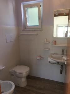 Een badkamer bij Residence Santa Maria Suites