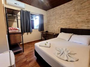 Postel nebo postele na pokoji v ubytování Hotel Serra do Mar